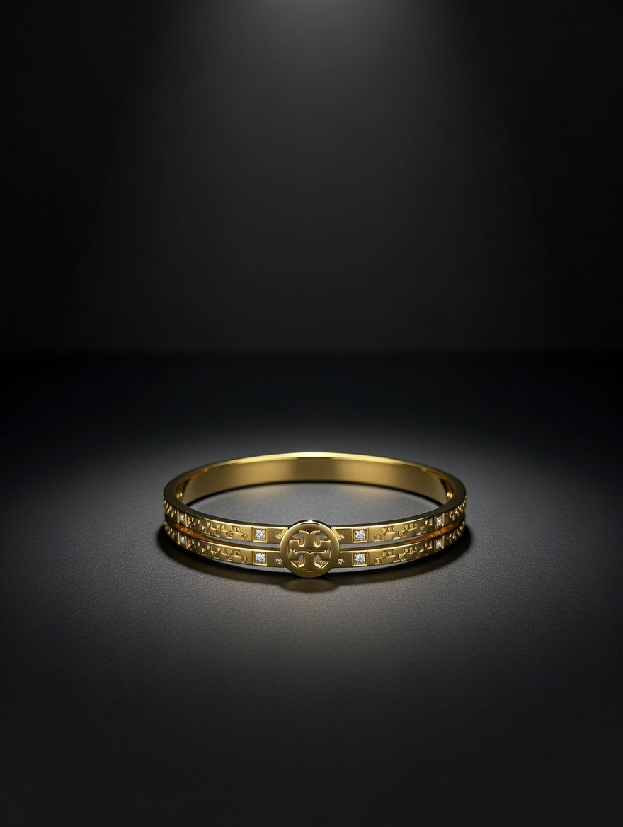 TORY GOLDEN BANGLE